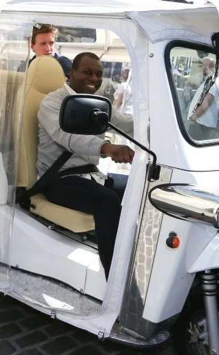 driver is ready to pick you up in a tuktuk